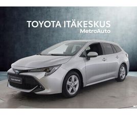 TOURING SPORTS 1,8 HYBRID PRESTIGE EDITION