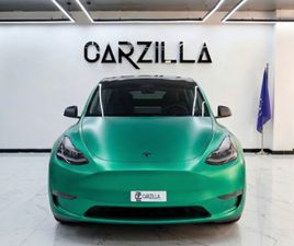 TESLA MODEL Y LONG RANGE AED 1,860 / MONTHLY L TESLA MODEL Y 75 KWH L LONG RANGE ELECTRIC SUV L GREEN