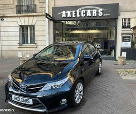 TOYOTA AURIS TOYOTA AURIS 1.8 HYBRID DYNAMIC 136H BVA CLIMATISATION AUTOMATIQUE BLUETOOTH JANTES ALLIAGE RÉTROVISEUR EXT RABATTABLE ÉLECTRIQUEMENT RÉGULATEUR DE VITESSE FEUX