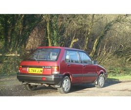 SUBARU JUSTY 1994 SUBARU JUSTY ROUGE FONCÉ AUTOMATIQUE CONDUITE À DROI...