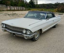 CADILLAC DEVILLE DÉCAPOTABLE