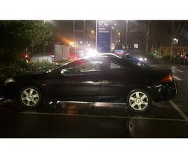 2001 FORD COUGAR NOIR MANUEL, 4 VITESSES CONDUITE À DROIT...