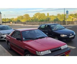 NISSAN SUNNY 1988 NISSAN SUNNY ROUGE MANUEL, 5 VITESSES CONDUITE À GAU...