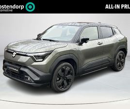 SUZUKI E-VITARA STYLE 61 KWH **NIEUWE BI-TONE KLEUR LAND BREEZE/ BLUISH BLACK/ PANORAMA/ NIEUWE AUTO**