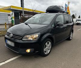 VOLKSWAGEN TOURAN MIT AUTOMATIKGETRIEBE ZU...