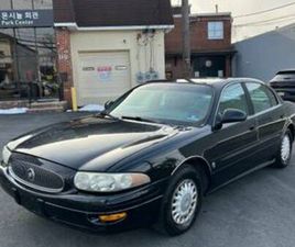 FOR SALE IS A 2003 BUICK LESABRE WITH A BLACK EXTERIOR AND GRAY