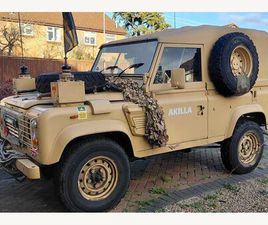 A RARE OPPORTUNITY TO OWN A LAND ROVER 90 WOLF REPLICA, FINISHED IN STRIKING DESERT CAMOUFLAGE WITH WHIP AERIALS FOR THAT AUTHENTIC MILITARY LOOK.