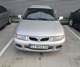 MITSUBISHI CARISMA ≫ 1997 • 2 100 ЛВ. • ID