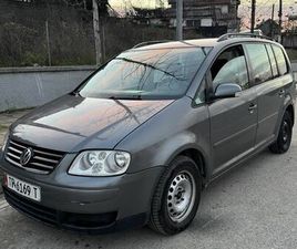 OKAZION SHITET TOURAN 2005