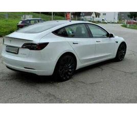 MODEL 3 LONG-RANGE DUAL MOTOR PERFORMANCE AWD PERFORMANCE