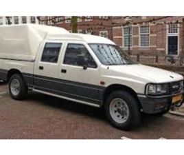 OPEL CAMPO ≫ 2000 • 11 ЛВ. • ID