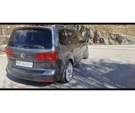 VW TOURAN 1,6 DSG TDI BLUEMOTION 105 CV 77 KW, 7 PLÄTZE CANTON GRISONS - TUTTI.CH