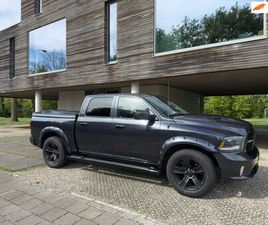 DODGE RAM 1500 - 5.7 V8 QUAD CAB 6'4 L MARGE L LUCHTVERING L 3500KG TREKGEWICHT L STOELVERWARMING EN KOELIN