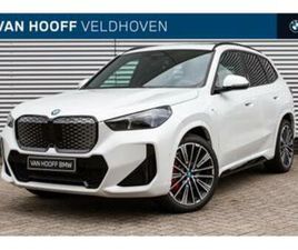 BMW IX1 EDRIVE20 M SPORT / PANORAMADAK / TREKHAAK / SPORTSTO — BMW — MARKTPLAATS