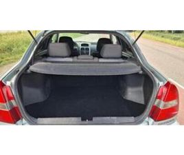 MITSUBISHI CARISMA MITSUBISHI CARISMA 1.6 SHOGUN SE HB 2004 GRIJS — MITSUBISHI — MARKTPLAATS