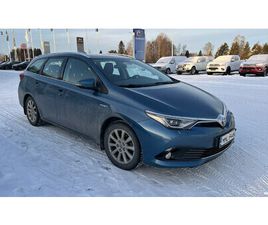 TOURING SPORTS 1,8 HYBRID ACTIVE