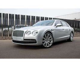 6.0 BITURBO W12. (TVA RÉCUPÉRABLE)