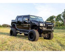 2007 HUMMER H2 SUT LIFTED ON 40S