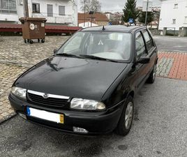 MAZDA 121 . JULHO/98