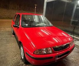 ② MAZDA 121 — MAZDA — 2EMEMAIN