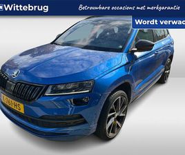 SKODA KAROQ - 1.5 TSI ACT SPORTLINE BUSINESS / DIGITAAL DASHBOARD / NAVIGATIE / TREKHAAK / CAMERA / PARK
