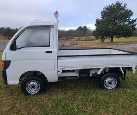 # 19 1994 DAIHATSU HIJET 4X4, HI-LO, 5 SPEED. ONLY 8,700 MILES