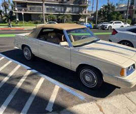 1986 DODGE 600 CONVERTIBLE – 32K MILES, NEW ENGINE, MINT INTERIOR
