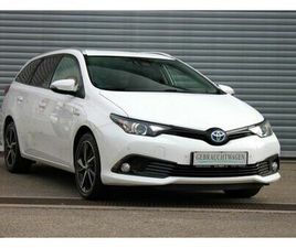 TOYOTA AURIS TOURING SPORTS HYBRID TEAM D