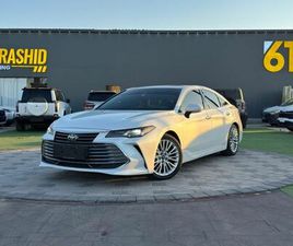 TOYOTA AVALON ( 2019 MODEL ) IN WHITE COLOR GCC SPECS THIS HAS DONE A KILOMETER OF107,000 KM
