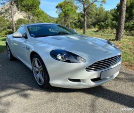 ASTON MARTIN DB9 - PREMIÈRE MAIN - CARNET 100% ASTON MARTIN - PARFAIT ÉTAT