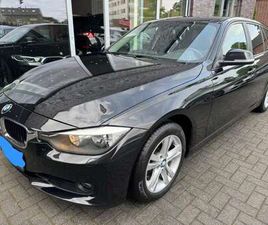 320I TOURING LUXURY