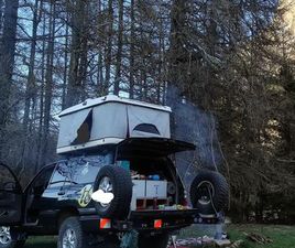 TOYOTA LAND CRUISER TOYOTA LAND CRUISER HDJ 100 – BOÎTE AUTO 5 VITESSES (2003) – INTÉRIEUR CUIR – ÉQUIPÉ BIVOUAC