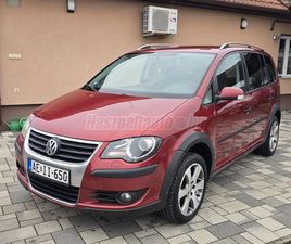 VOLKSWAGEN TOURAN CROSS2.0 PD TDI DPF KLÍMA/ÜLÉSFŰTÉS/RADAR/4 ELEKTROMOS ABLAK/VONÓHOROG