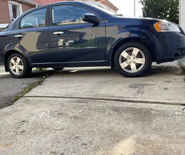 2010 CHEVROLET AVEO LT. ONLY 55555 KM ORIG LOW MILEAGE. SUNROOF