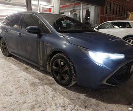 TOURING SPORTS 2,0 HYBRID STYLE