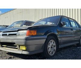 1990 NISSAN SUNNY NOIR MANUEL, 5 VITESSES CONDUITE À GAUC...