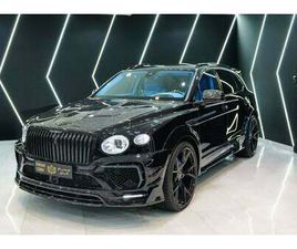 BENTLEY BENTAYGA V8 MANSORY, FULL FORGED CARBON, REAR ENTERTAINMENT, PANORAMIC ROOF W/ STARLIGHT!!