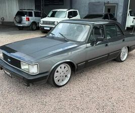 OPALA COMODORO 6CC (PERICIADO / BANCOS COURO) - 1986