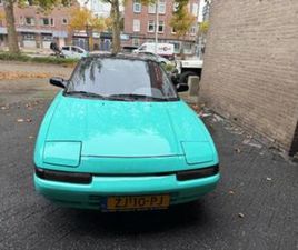 MAZDA 323 1.6 I F GLX U9 1991 TIFFANY BLUE/HIGHLOSS BLACK — MAZDA — MARKTPLAATS