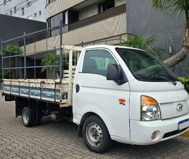 HYUNDAI HR HYUNDAI HR 2.5 TURBODIESEL - RODADO DUPLO 2010 (CARROCERIA DE MADEIRA 3,20 X 1,80 X 2,20)