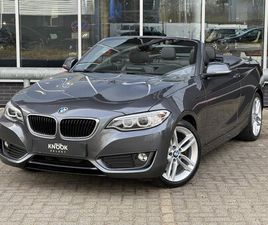 BMW 2-SERIE CABRIO - 228I HIGH EXECUTIVE AUTOMAAT / NAVIGATIE / TREKHAAK / LEDER / XENON / REGENSENSOR / MULTIF