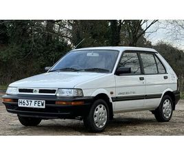 1991 SUBARU JUSTY BLANC AUTOMATIQUE, 4 VITESSES CONDUITE...