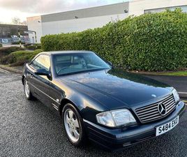 3.2 SL320 CONVERTIBLE 2DR PETROL AUTOMATIC-SUPERB LOW MILEAGE EXAMPLE.FINISHED IN RARE EMERALD BLACK METALLIC.HEATED GREY LEATHER UPHOLSTERY-CLIMATE C