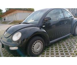 VOLKSWAGEN NEW BEETLE,