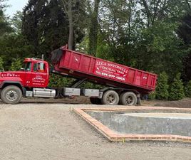 MACK R SERIES 1999 MACK ROLL OFF