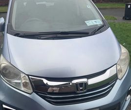 HONDA FREED HYBRID 7 SEATER
