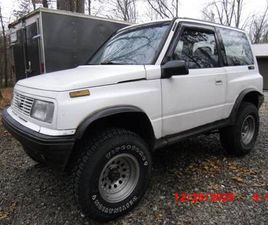 1995 GEO TRACKER TIN TOP 4X4 2 DR HRDTOP
