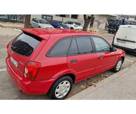 MAZDA 323 MAZDA 323 F 1,3 I, 2002 GOD.