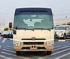 TOYOTA COASTER 2.7L PETROL M/T DUAL TONE / 23 SEATER / AUTO DOOR / HLF LUGGAGE RACK (CODE#COPB)