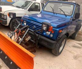 SUZUKI SJ 410 WINTERDIENST MIT SCHNEESCHILD